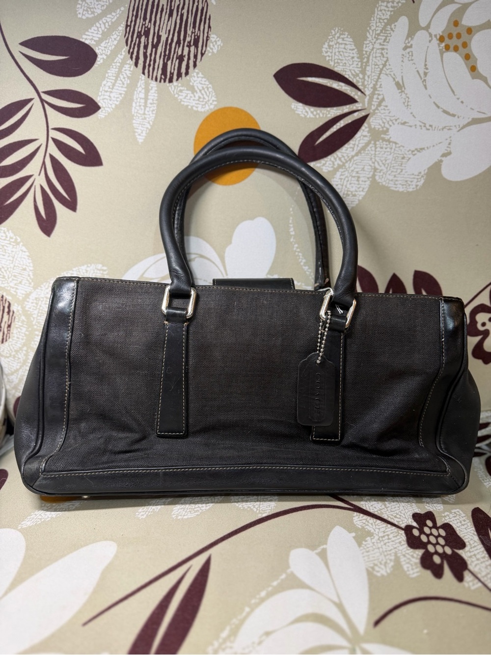 Vintage black and gold coach hand bag